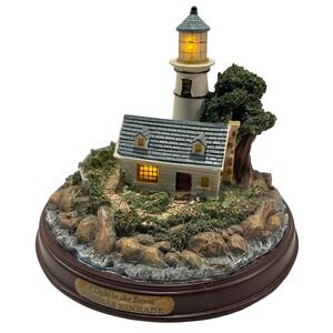 Thomas Kinkade A Light in the Storm Illuminated Lighthouse Figurine Sculpture